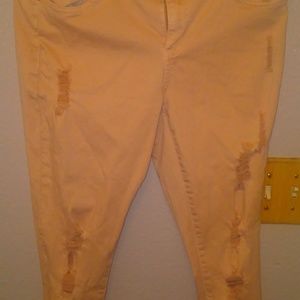 Light pink ripped jeans